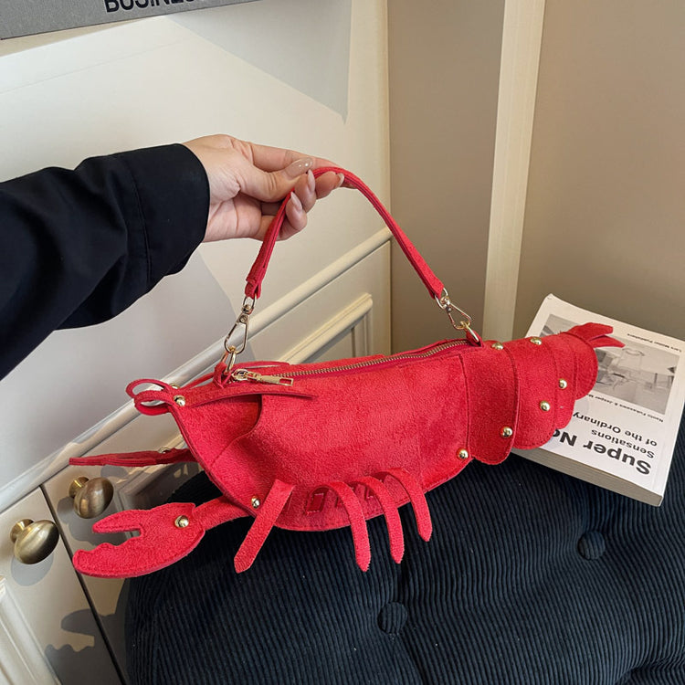 Korean style personalized messenger bag in a unique lobster design with red suede texture.
