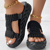 Braided knit platform sandals featuring a unique pattern and a thick MD sole for comfort and durability.