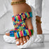 Colorful braided summer sandals with rainbow pattern and thick sole, perfect for summer wear.