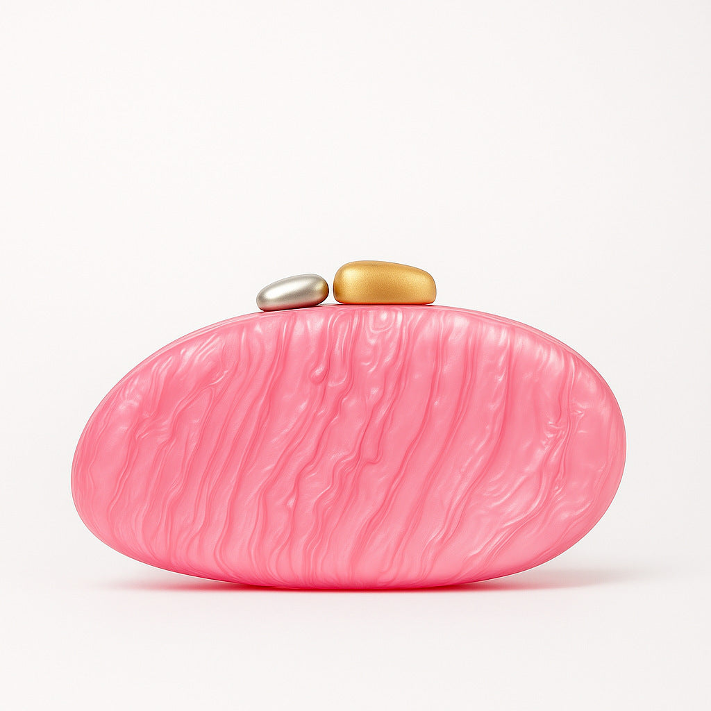 New Fashion Special-shaped Dinner Clutch in pink with decorative stones on top.