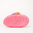 New Fashion Special-shaped Dinner Clutch in pink with decorative stones on top.