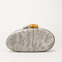 New Fashion Special-shaped Dinner Clutch in silver with decorative stones in gold and silver.