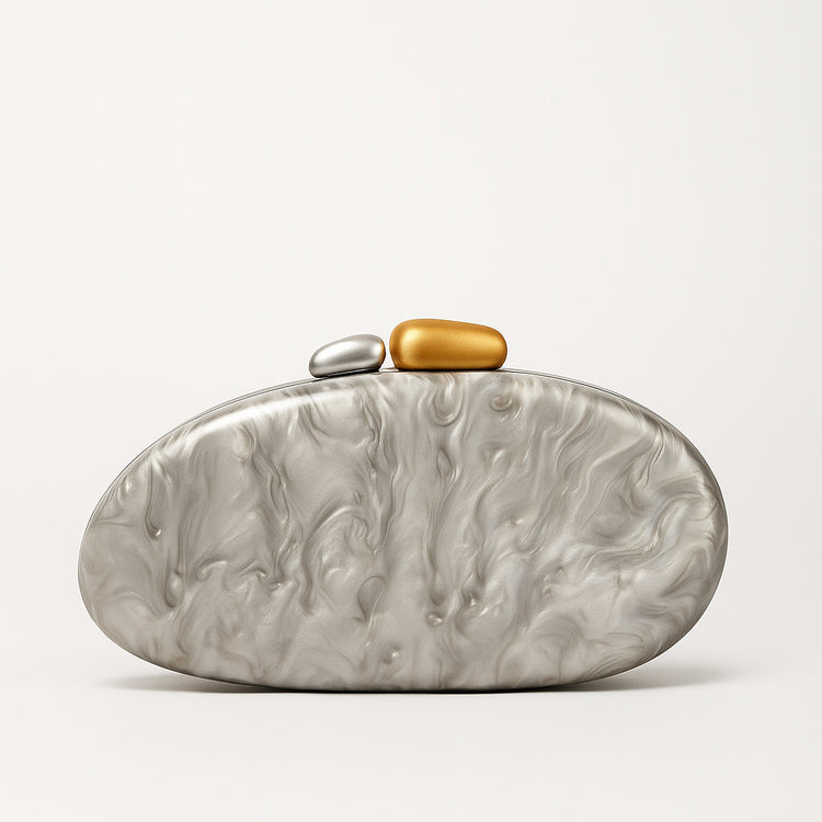 New Fashion Special-shaped Dinner Clutch in silver with decorative stones in gold and silver.