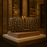 Clutch Bag Shape Crossbody Single Shoulder Dinner Bag displayed in a modern showcase with a leopard print design.