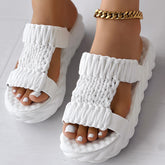 Braided knit summer sandals in white with thick sole and unique design, perfect for summer wear.