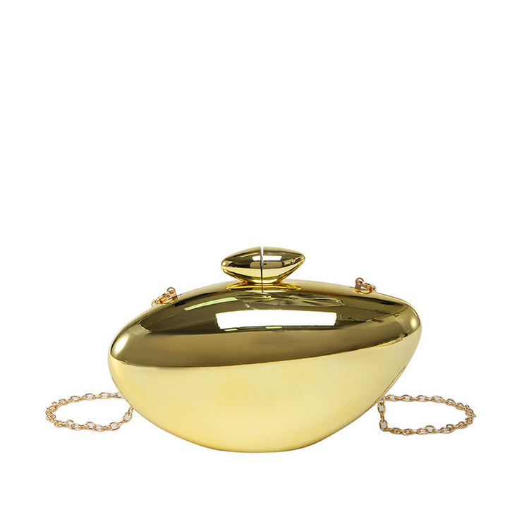 Oval shell acrylic evening bag in gold color with a hard exterior and a stylish design.