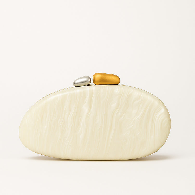 New Fashion Special-shaped Dinner Clutch in ivory with decorative metallic accents on top.