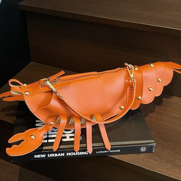 Korean style personalized messenger bag in vibrant orange with unique lobster design and rivets, perfect for daily matching.