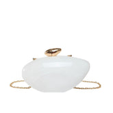 Oval shell acrylic evening bag in white color with a gold clasp and chain strap.